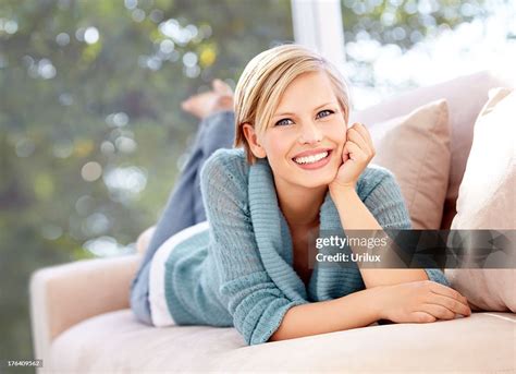 Comfortable On The Couch High-Res Stock Photo - Getty Images