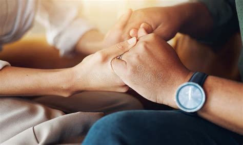 Holding Hands, Love and Couple on Sofa with Support for Marriage Counseling Together with ...