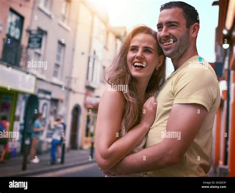 Taking their love across the world. Shot of a happy young couple sharing an affectionate moment ...