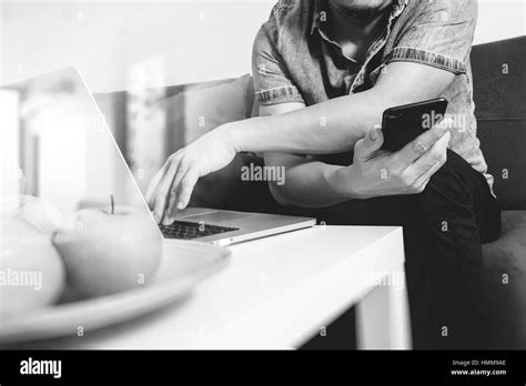 Man laptop sofa Black and White Stock Photos &amp; Images - Alamy