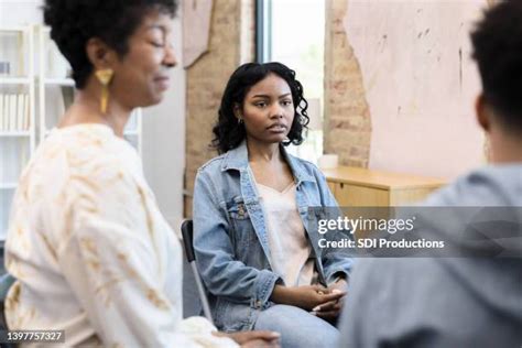Listening Intently Photos and Premium High Res Pictures - Getty Images