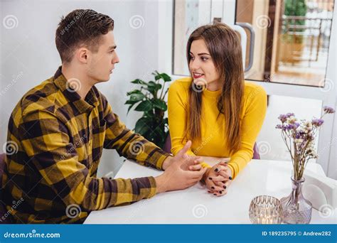 Caucasian Couple Talking and Relaxing Together in a Cafe, Looking ...