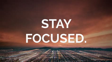 “STAY FOCUSED.” Wallpaper by QuoteFancy