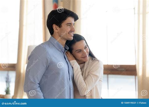 Happy Young Couple Look in Distance Planning Future Together Stock ...