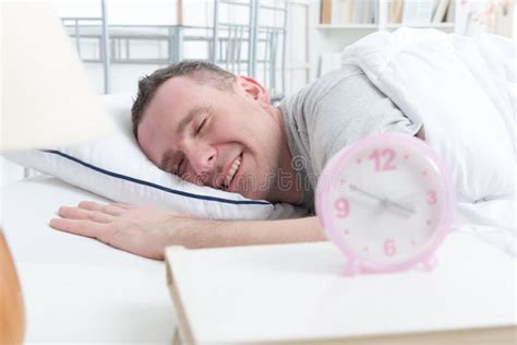 Man peacefully laying stock image. Image of bedtime, handsome - 68111119