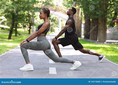 Sporty Lifestyle. Black Fitness Couple Working Out Together in Park ...