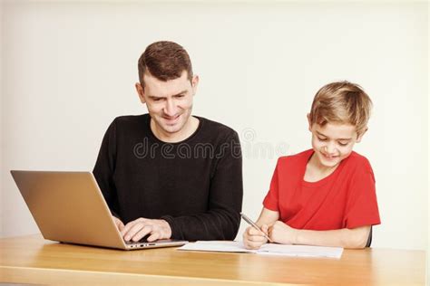 Father Helping His Son with Homework Stock Image - Image of learning, family: 113438781