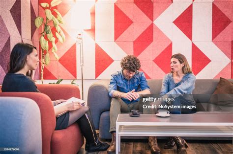 Counseling Therapist Talking To Couple In Couples Therapy Session High-Res Stock Photo - Getty ...