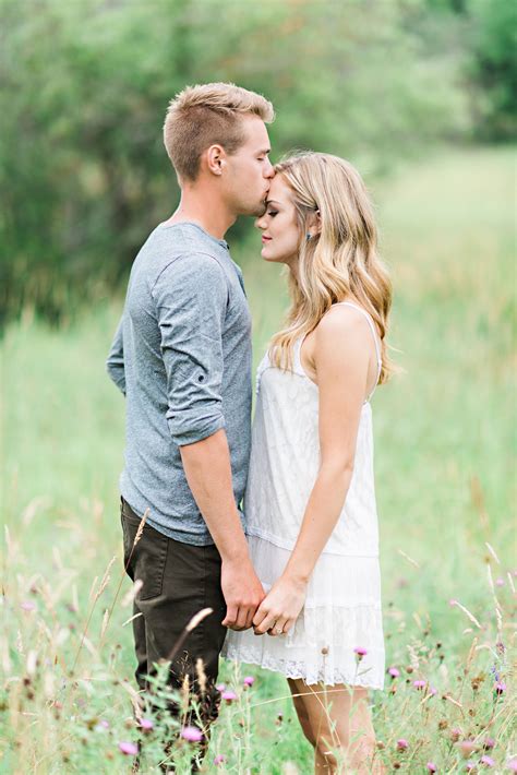 Blonde Couple In Field on their Whimsical Outdoor Engagement Shoot ...