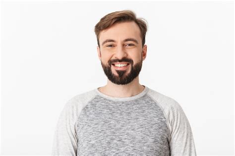 Premium Photo | Cheerful young man isolated over white wall