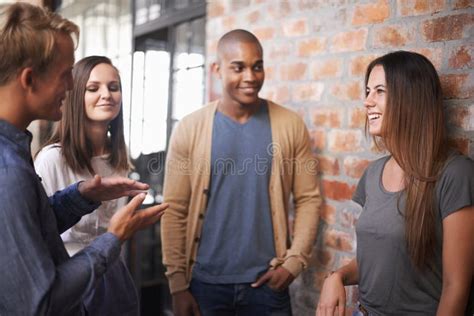 Impromptu Get-together. a Diverse Group of Friends Talking in a Hallway. Stock Photo - Image of ...