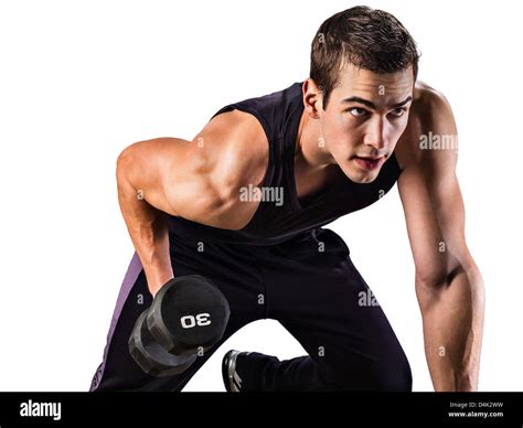 Man lifting weights Stock Photo - Alamy