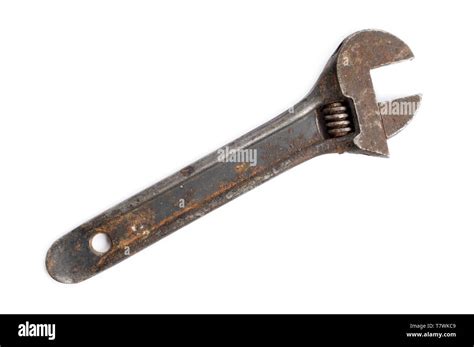 Old adjustable wrench on white background Stock Photo - Alamy