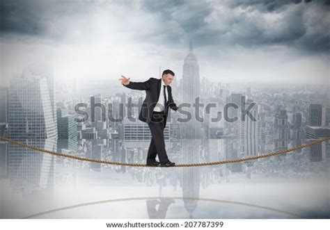 Mature Businessman Doing Balancing Act On Stock Photo 207787399 ...