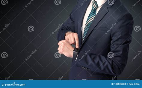 Man in Suit Wearing Smartwatch. Stock Photo - Image of elegant, online ...