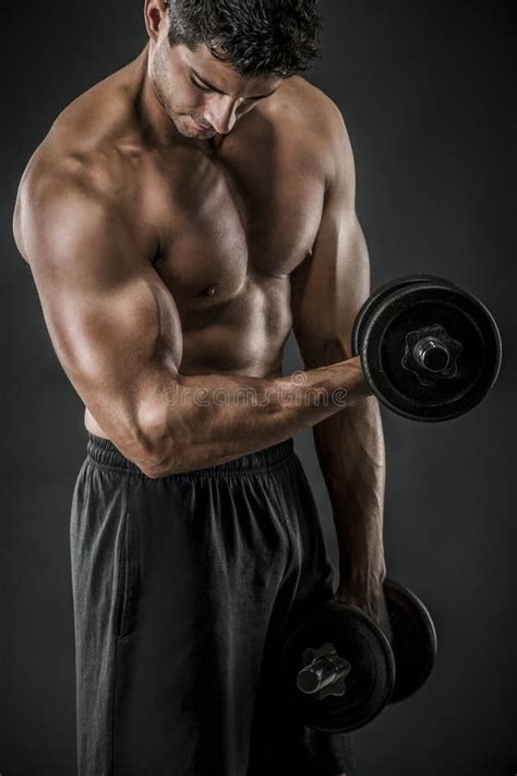 Athletic Man Lifting Weights Stock Photo - Image of isolated ...
