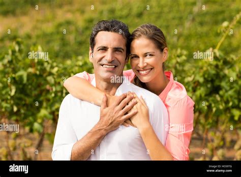 Happy couple embracing each other Stock Photo - Alamy