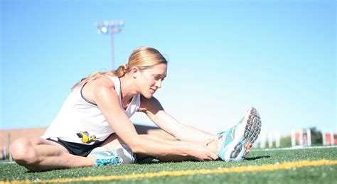 Fit Runner Stretching After Running