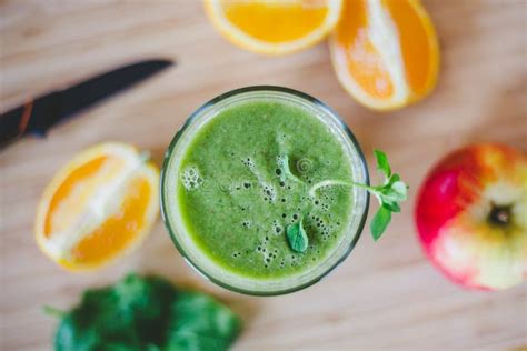 Good Morning: Fresh Green Smoothie and Fruits on Wooden Background ...