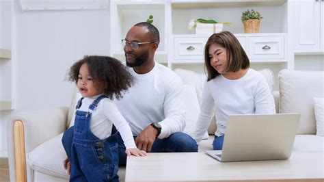 Happy Diverse Family Using Computer Laptop Stock Footage SBV-347789859 - Storyblocks