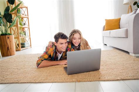 Young Couple Enjoying Quality Time Together on Cozy Carpeted Floor with ...