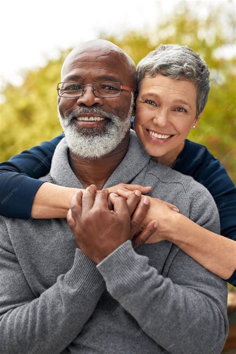 Premium Photo | Portrait park or senior couple with hug interracial or ...