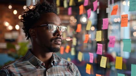 Man Contemplating Project Plans | Premium AI-generated image