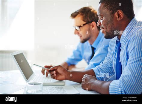 Businessman working on project hi-res stock photography and images - Alamy