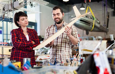 Positive smiling couple enjoying their hobbies - modeling light ...