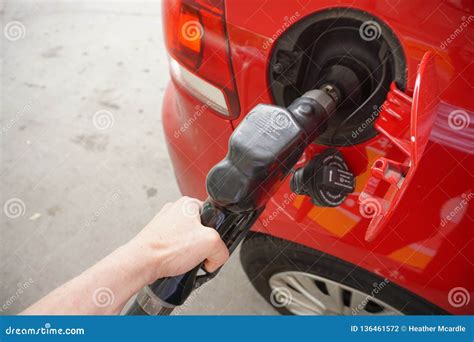 Pumping Gasoline into Gas Tank Stock Photo - Image of flammable, credit ...