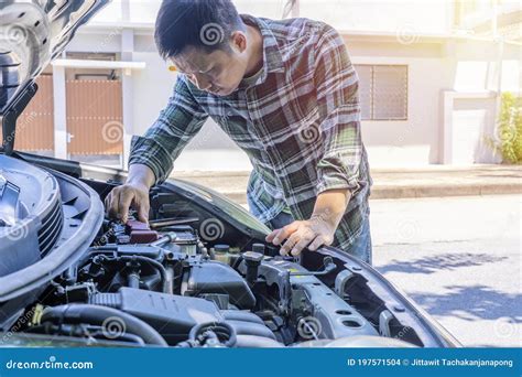 Man with Checking Car Engine Stock Photo - Image of fuel, engine: 197571504