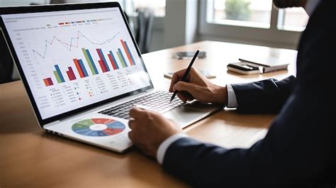 A person analyzing data on a chart with a focused expression person analyzing data chart focused ...