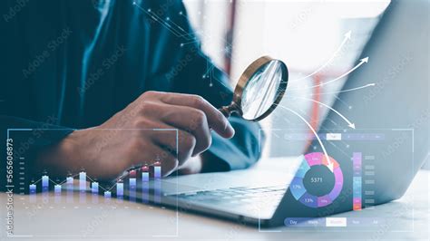 analyst using magnifying glass for data analysis, I business analytics ...