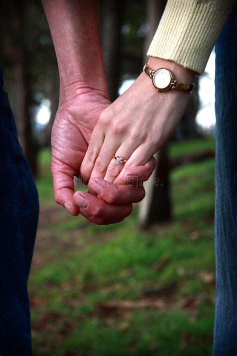Couple holding hands stock image. Image of couple, wedding - 12439403