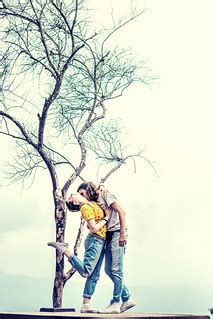 A view of a loving couple posing on the beautiful white sk… | Flickr