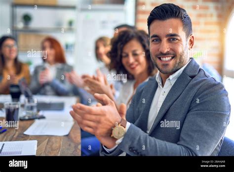 Group of business workers smiling happy and confident. Working together with smile on face ...