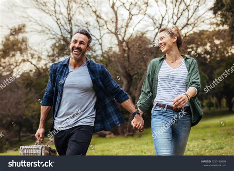 96,683 Couple holding hands walking Images, Stock Photos &amp; Vectors ...