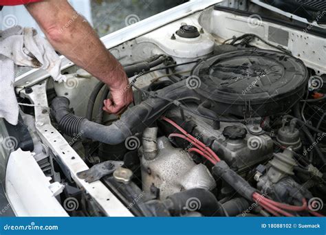 Checking car oil stock photo. Image of check, engine - 18088102