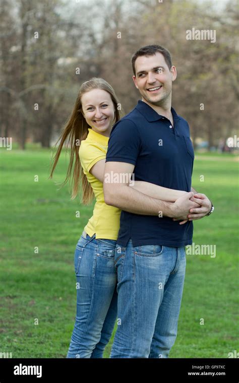 Portrait of love couple embracing outdoor Stock Photo - Alamy