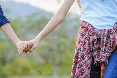 lgbtq couples hold hands to express their love and show couples confidence in their love for ...