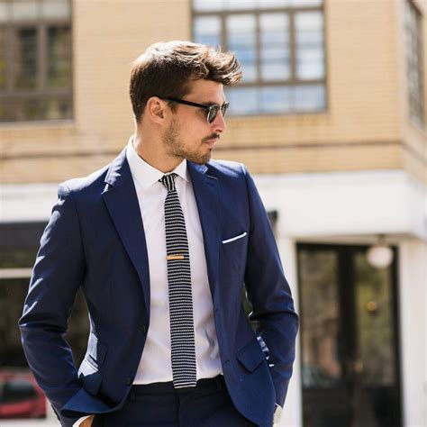 What 3 versatile style pieces help men master gym-to-office transitions?