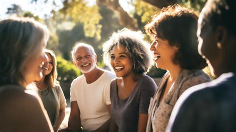 Premium Photo | A diverse group of individuals in a park engaging in a friendly and supportive ...