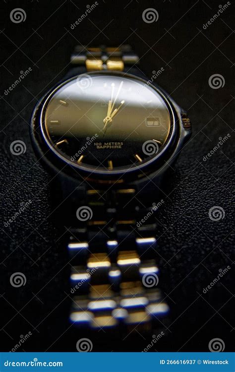 Close-up Shot of a Luxury Watch Lying on a Black Leather Background ...