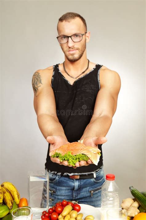 Fitness Young Man Presenting His Healthy Diet for Powerfull Body Stock ...