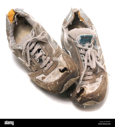 Worn out trainers Stock Photo - Alamy