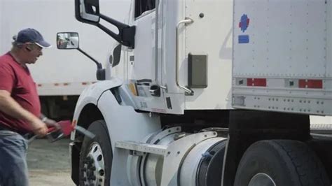 Truck driver filling up fuel tank of sem... | Stock Video | Pond5