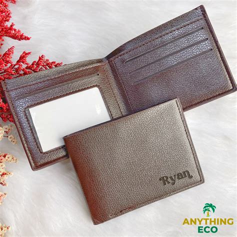 What specific design element, often overlooked, significantly enhances the longevity or utility of a men’s leather wallet?