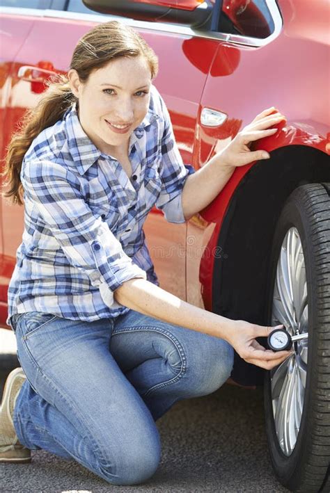 Portrait of Woman Checking Car Tyre Pressure Using Gauge Stock Photo - Image of repairing ...
