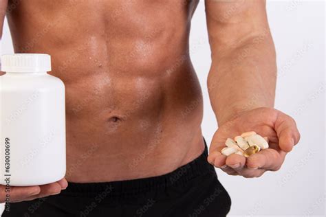 Sports, healthy eating and a healthy lifestyle. Young attractive man on ...