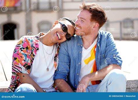 Happy Couple Talking and Laughing while Relaxing in the City Centre. Hipster Style Stock Photo ...